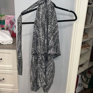 hard to tell in photo. Black and white romper. Very nice for a dinner.